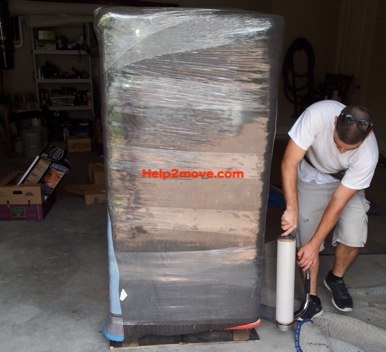Gun Safe mover: protection with padding and shrink wrapping